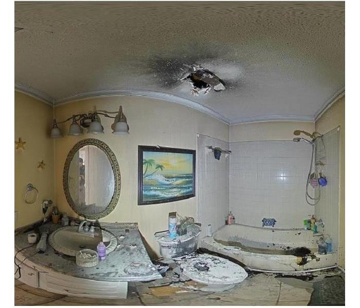 Bathroom fire damage in Navarre, FL